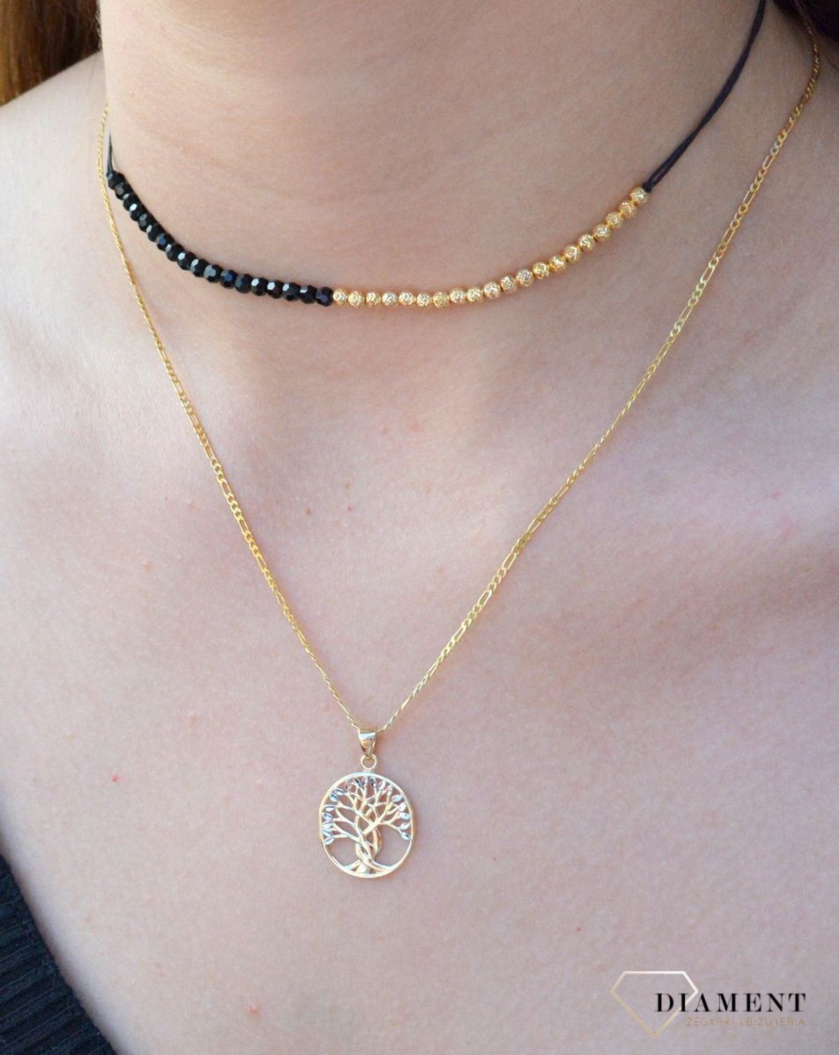 Złota zawieszka 'Drzewko szczęścia z białym złotem' ZA 4653 333. Nowoczesna zawieszka złota zawieszka drzewko szczęścia z białym złotem, w którym znajduje się kształt drzewka, które zostało ozdobione.jpg